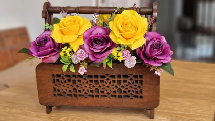 Wooden basket with roses