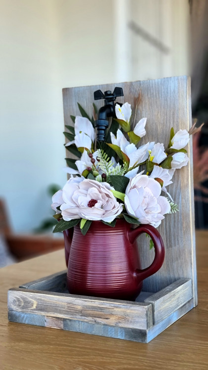 Flowers in a pitcher